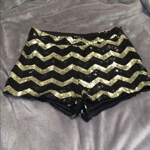 BLACK AND GOLD SEQUENCE BOOTY SHORTS